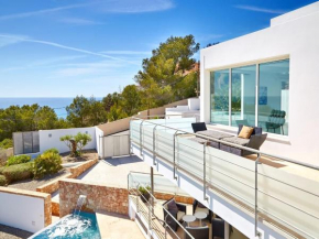 Modern villa with sun loungers